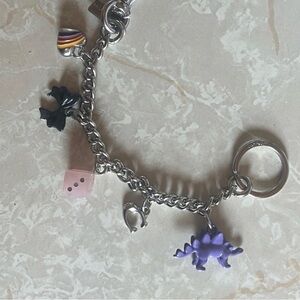Coach Charm Strap with Purple Dinosaur and Pink Dice